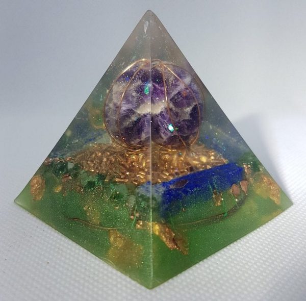 Ganymede Moon Orgone Orgonite Pyramid 6cm - Sphere of Amethyst, coiled in copper, with Lapis Lazuli points on a bed of copper and tensor rings